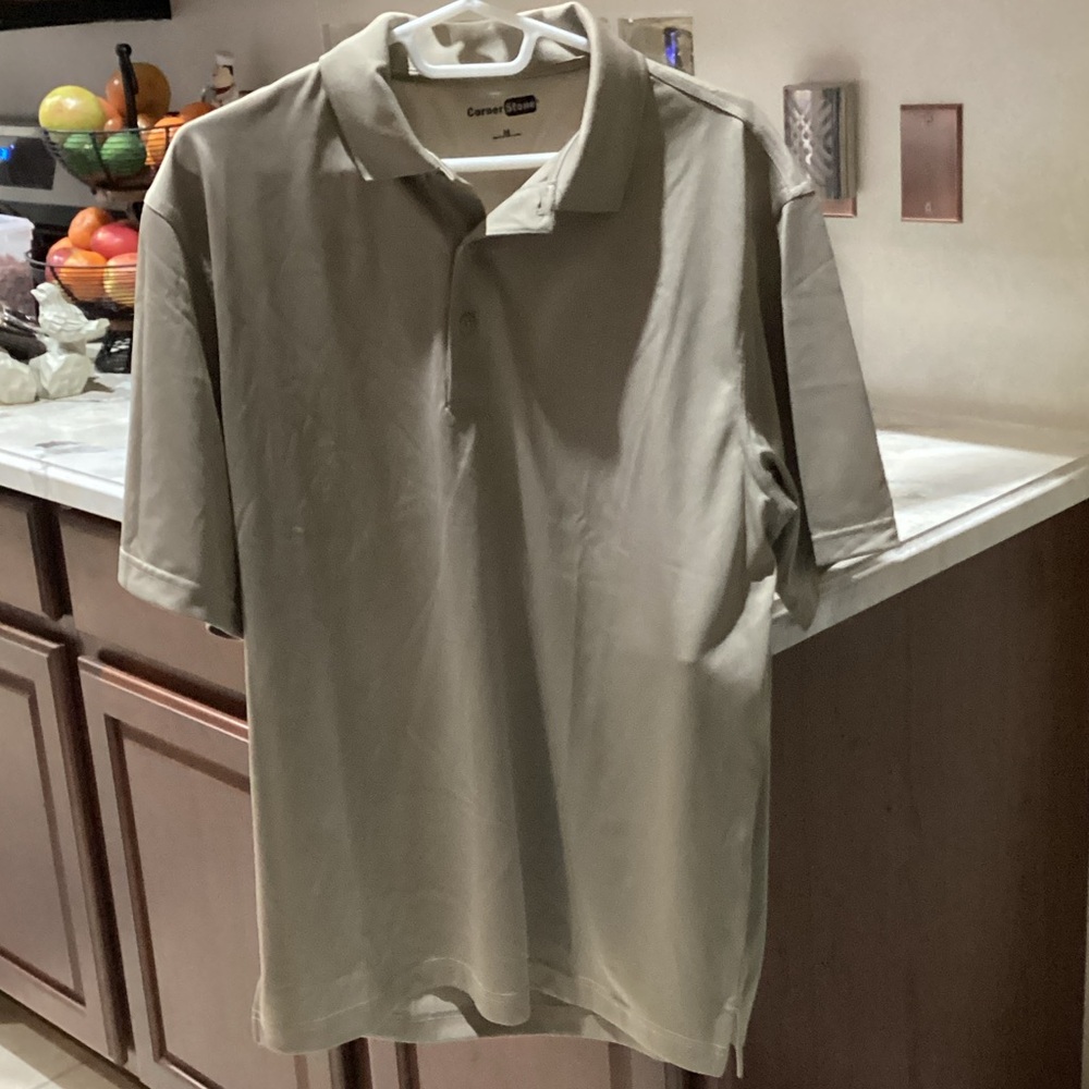 Men’s size Medium tan polo by Corner Stone